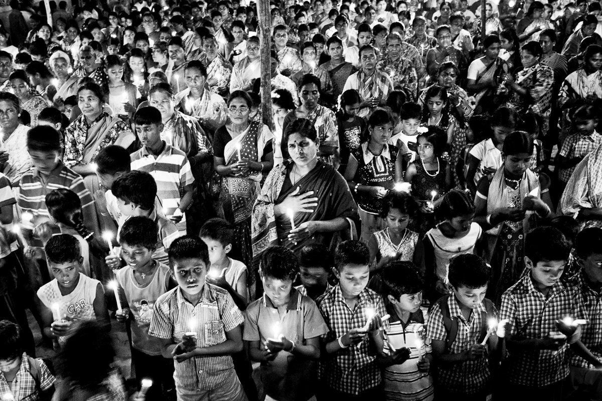 Villagers observe a candle light vigil to pay homage to Hiroshima victims on Hiroshima Day.