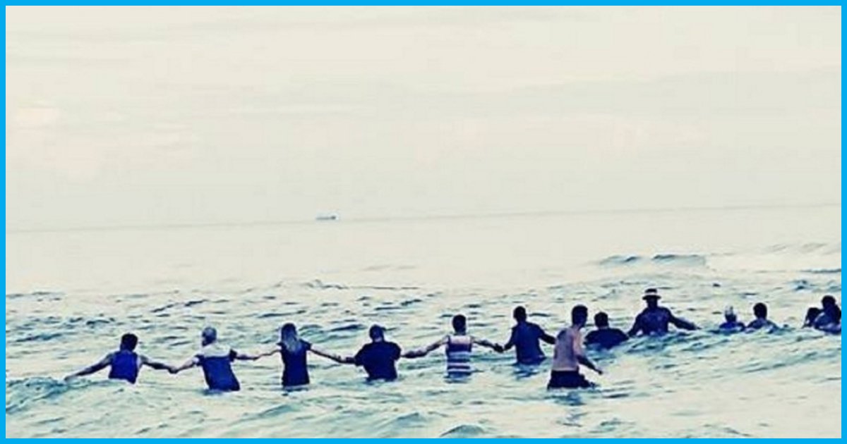 80 Strangers Form A Human Chain To Save A Family From Drowning In The Sea