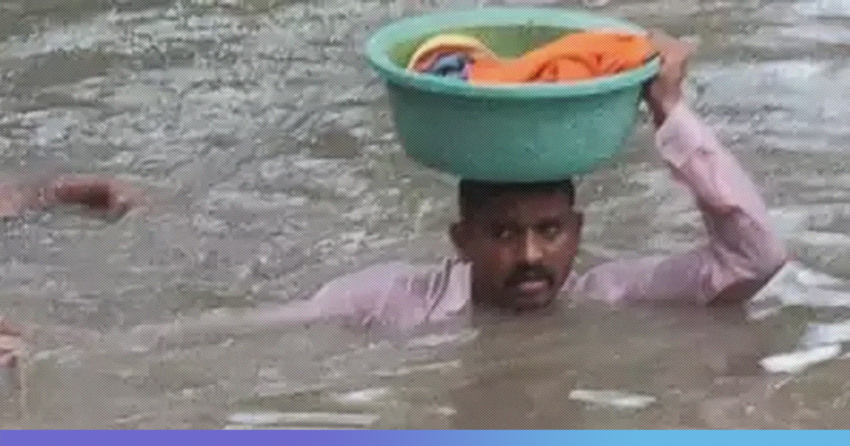 [WATCH] Modern Day Vasudev: Cop Carries Infant On Head In Neck-Deep Water