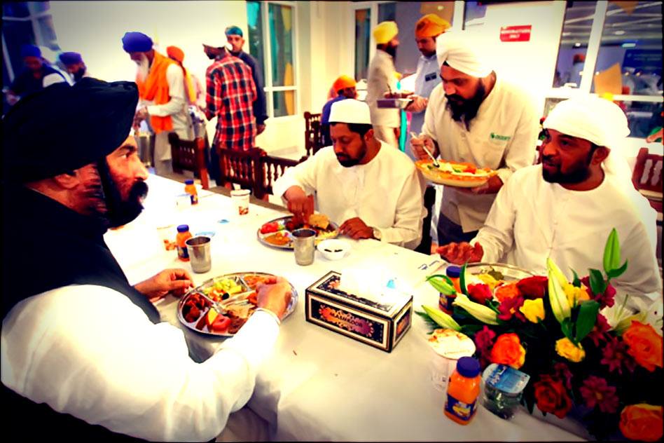 Iftar Dinner at a Gurdwara, with Muslims, Sikhs and Christians eating together.