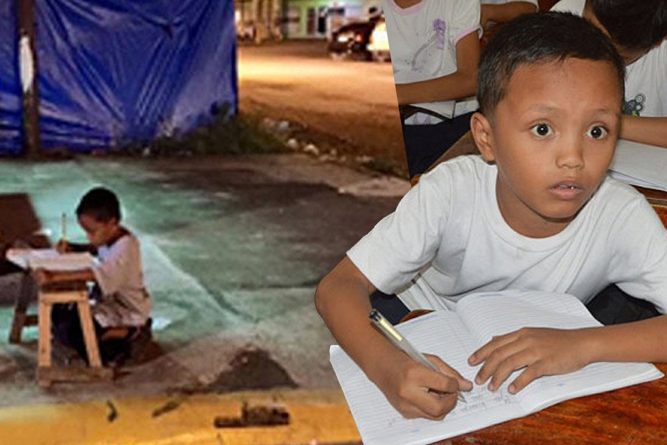 Aid Pours In After Picture Of Homeless Filipino Boy Studying On Street Goes Viral