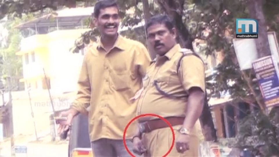 Kerala Policeman Unzips Fly to Intimidate Journalist
