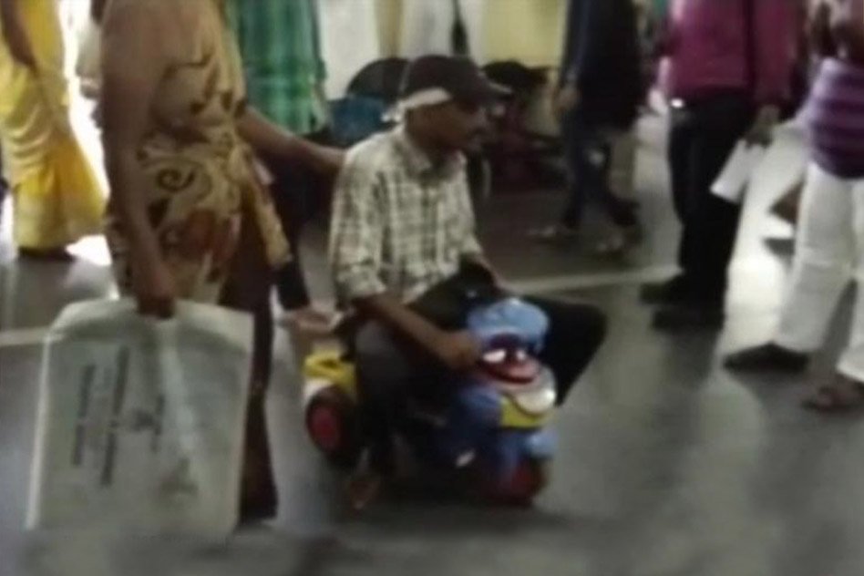 Asked To Pay Bribe For Wheelchair, An Accident Victim In Telangana Uses Son’s Mini-Scooter To Reach Hospital Ward