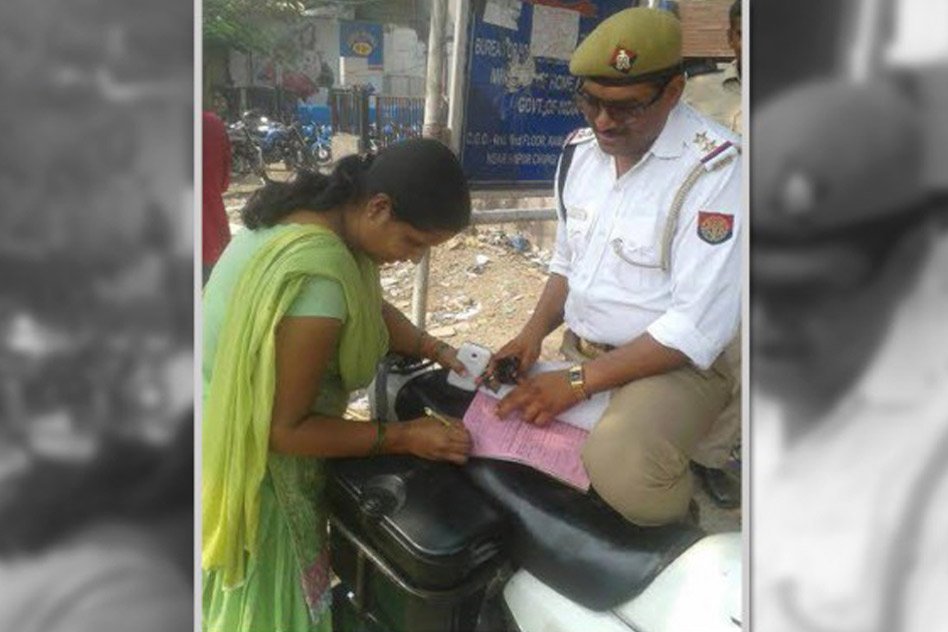 Cop Issues Challan To Wife For Not Wearing Helmet