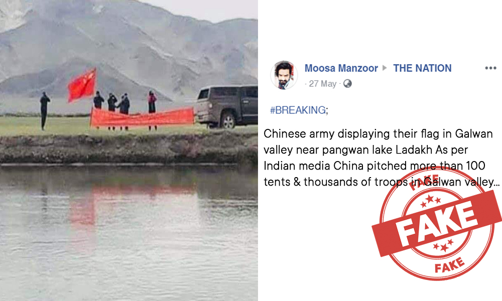 Fact Check: Old Picture Of A Group Of Man Holding A Chinese Flag Near A Lake Shared As Recent Development In Ladakh