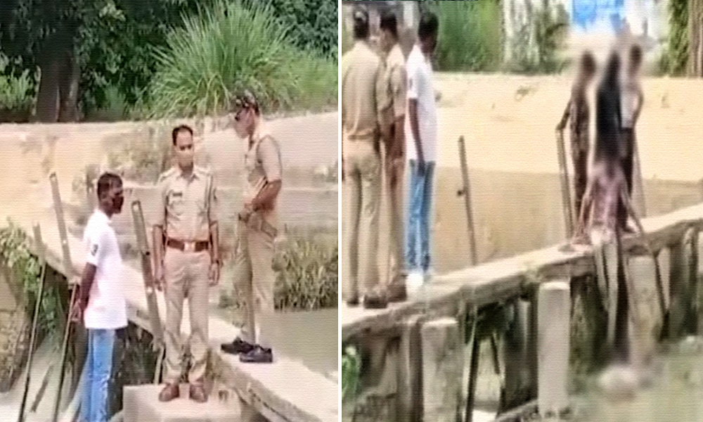 Minor Boys Fish Out Dead Body From Canal, UP Policemen Spectators To Incident