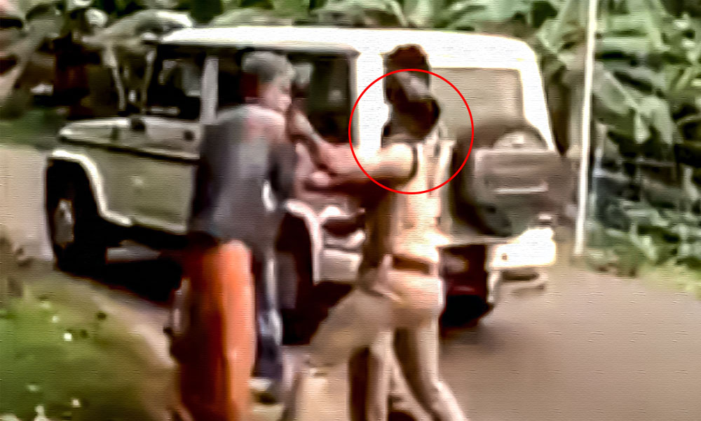 Caught On Camera: Kerala Cop Manhandles Senior Citizen For Not Wearing Helmet