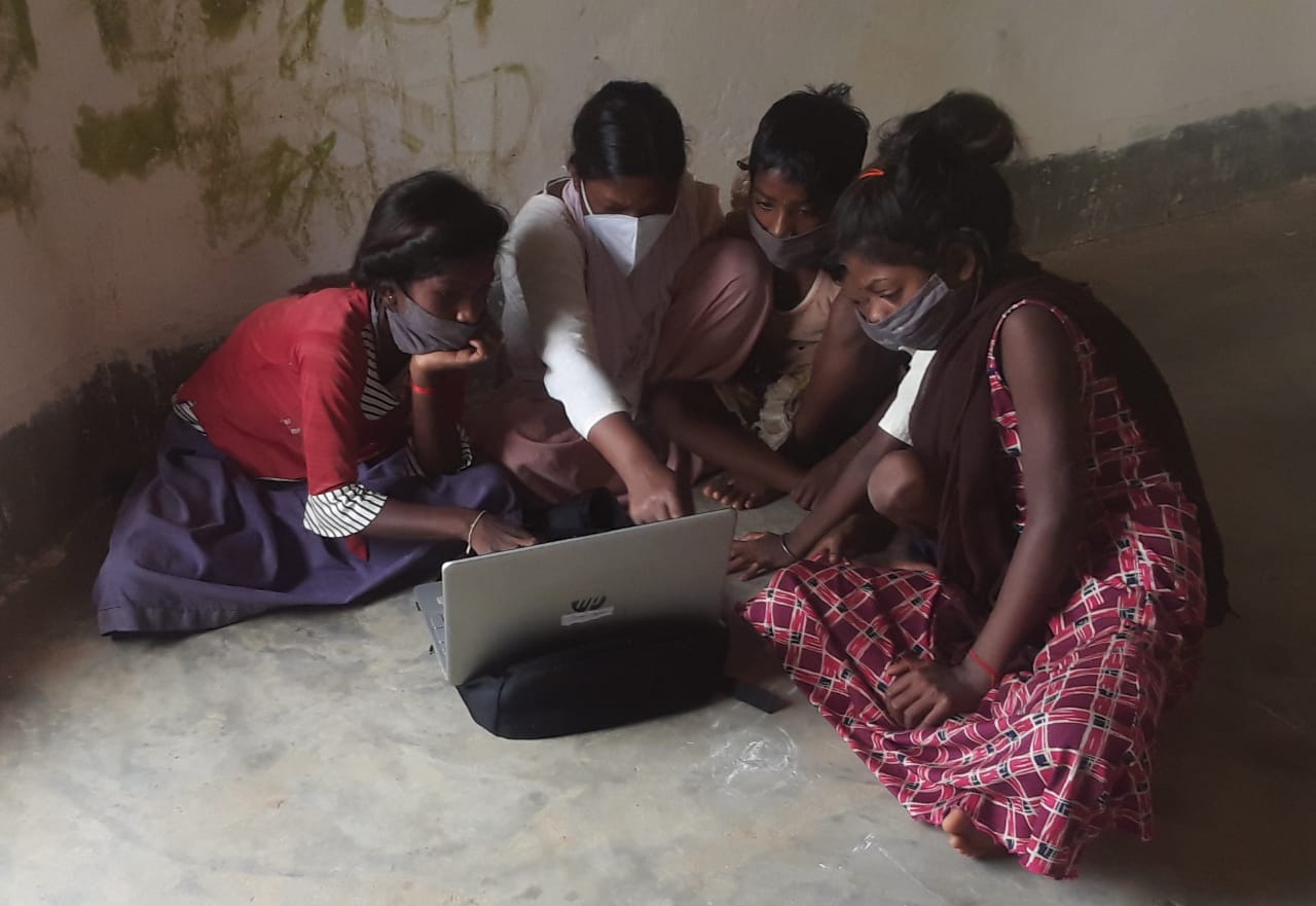 Students studying remotely in a tribal village in Bihar
