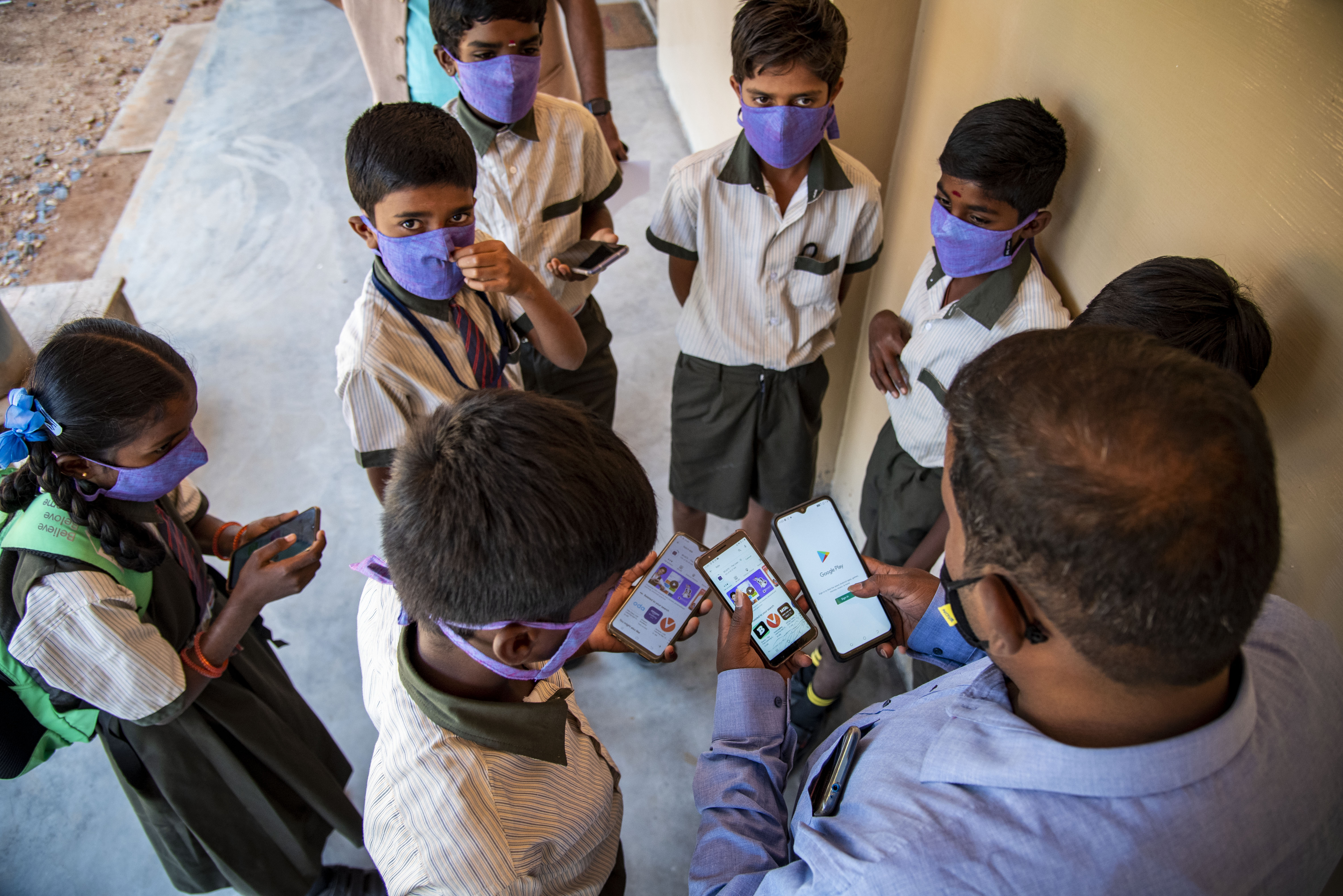 Children In A Govt School Discussing With Their Teachers