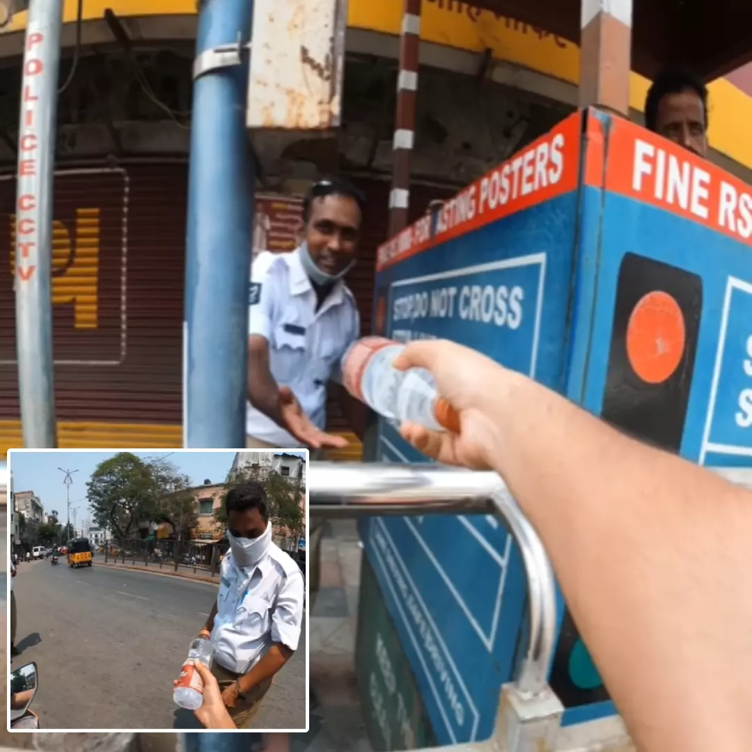 Heartwarming! Biker Distributes Water Bottles To Traffic Policemen In Hyderabad