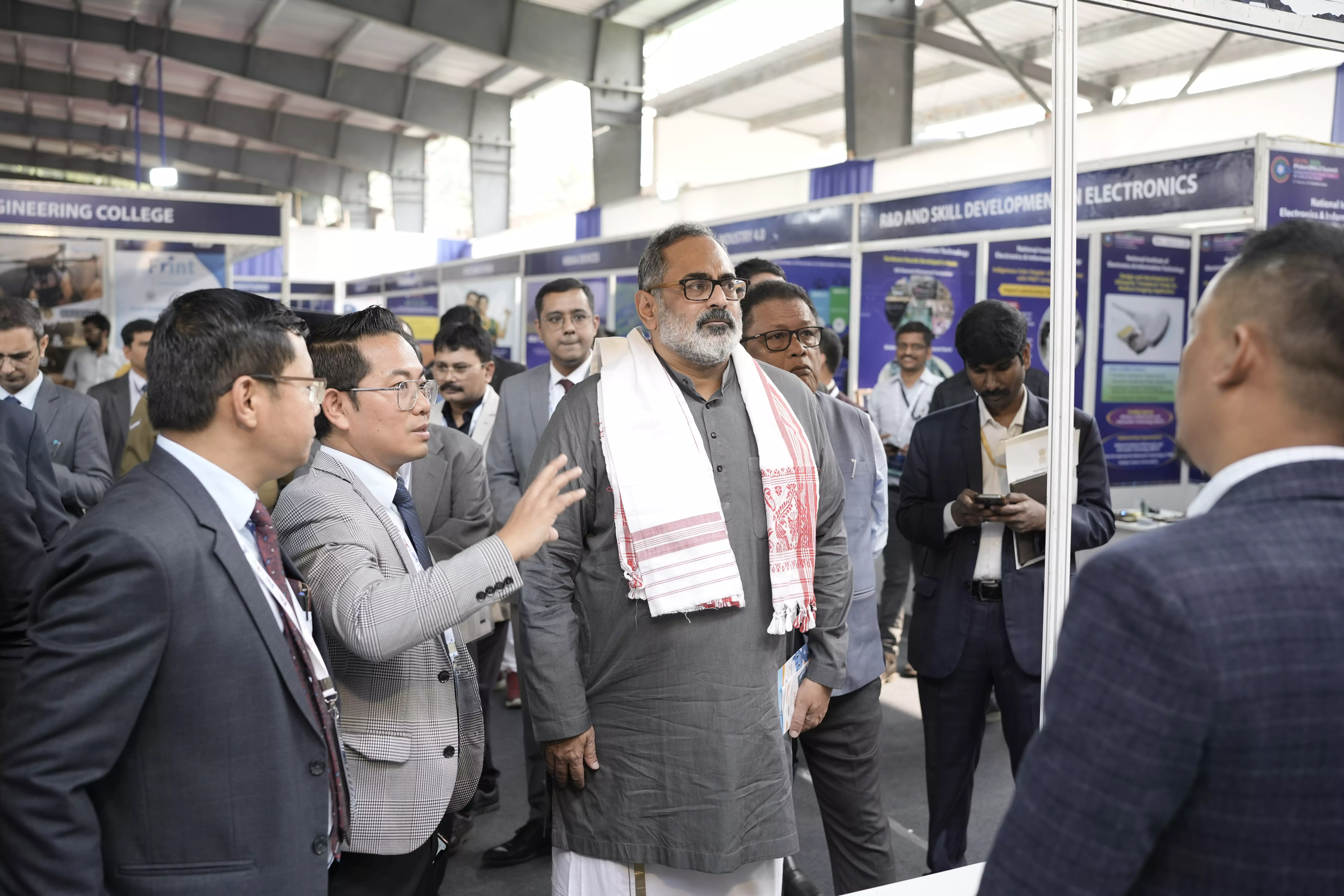 L Lanuwabang, Director of NIELIT Kohima, explaining MoS Rajeev Chandrasekhar about the stalls set up at the summit L Lanuwabang, Director of NIELIT Kohima, explaining MoS Rajeev Chandrasekhar about the stalls set up at the summit
